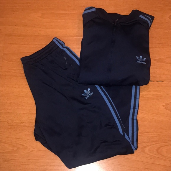 Adidas men small track suit.